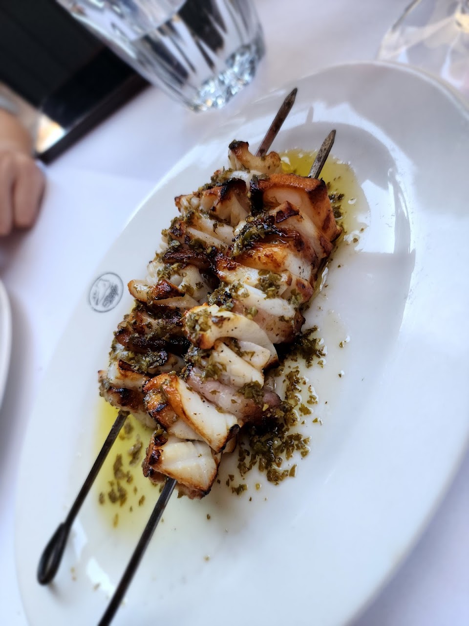 Grilled seafood skewers with herbs at Le Foote